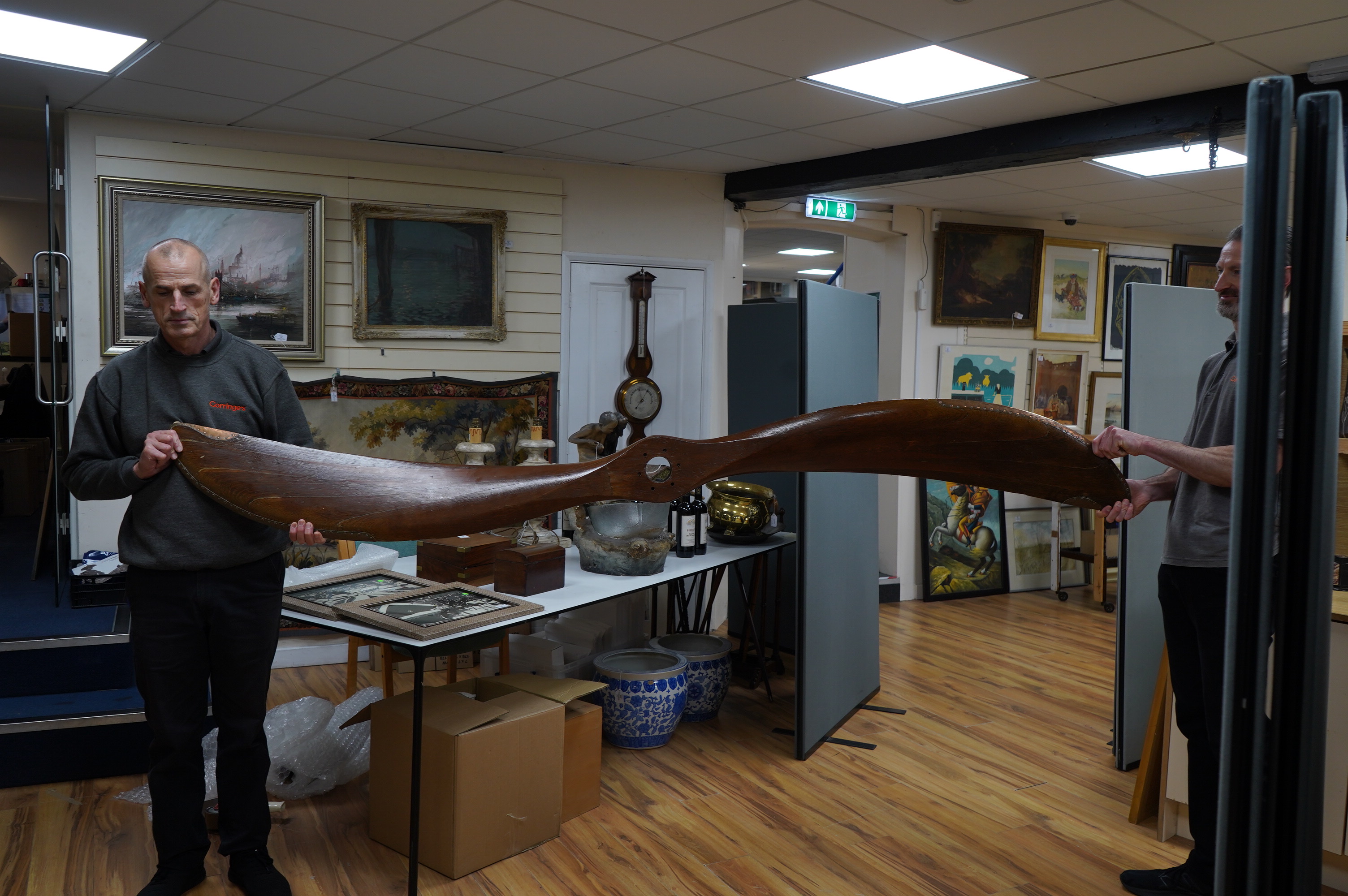 An early 20th century American laminated oak propeller with copper clad blade edges, Paragon stamp to the blade, 251cm wide. Condition - good